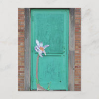Porte turquoise avec fleur de papier