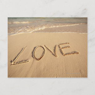 Carte Postale Sable "Love" écrit sur la plage avec l'arrivée