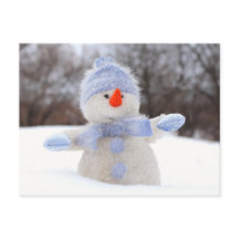 Sneeuwpop met blauwe doit