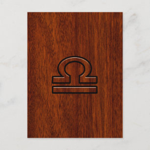 Carte Postale Symbole de la Libra Zodiac sur l'acajou