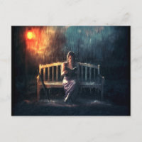 Une femme qui lit un livre sous la pluie