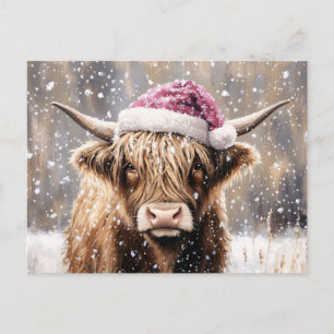 Carte Postale Vache des Highlands dans la neige avec un chapeau