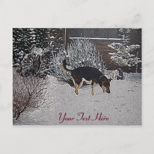 Carte Postale Winter snow scene with cute black and tan dog