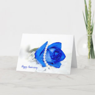 Carte rose bleu avec perles et coeurs