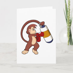 Carte Singe à la boxe avec sac de frappe