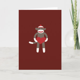 Carte Singe à soie mignonne avec Casquette tenant coeur