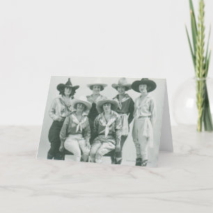 Carte Six cow-girls dans les casquettes et les ceintures