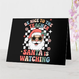 Carte Sois gentil avec le professeur, le Père Noël regar