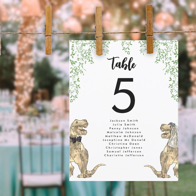 Carte Tableau Mariage à thème Dinosaur Tableau de sièges (Dinosaur themed wedding T-Rex bride and groom with jungle foliage table seating chart)