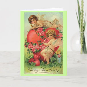 Carte vintage de Valentine avec des cupidons