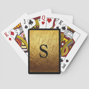 Cartes de jeu d'or décorées d'un monogramme