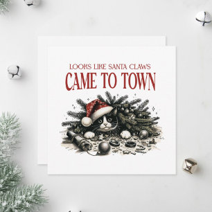 Cartes Pour Fêtes Annuelles Chat qui s'allonge sous un sapin de Noël.