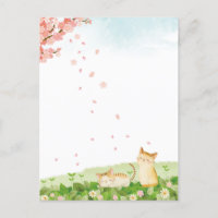 Chats amusants chantant sous les fleurs de cerisie