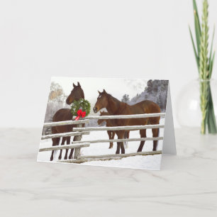 Cartes Pour Fêtes Annuelles Chevaux regardant sur la clôture dans la neige