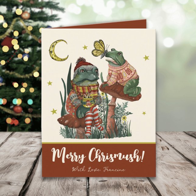 Cartes Pour Fêtes Annuelles Cute grenouille à champignons rouges et crapaud Jo (Whimsical Merry Christmas card with an illustration of frogs sitting on mushrooms drinking cocoa)