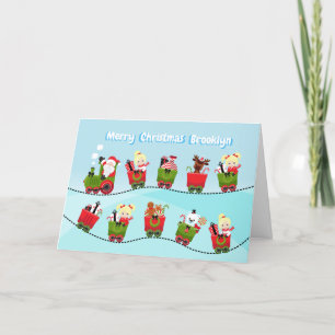 Cartes Pour Fêtes Annuelles Fille blonde voyageant en train avec le Père Noël