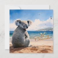 Koala sur une plage de sable Joyeux Noël