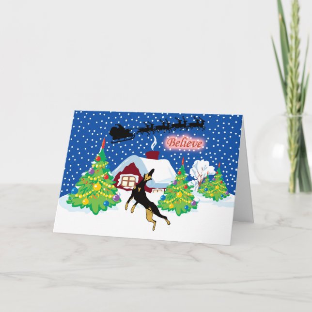 Cartes Pour Fêtes Annuelles Le dobermann croient au Noël de Père Noël (Devant)