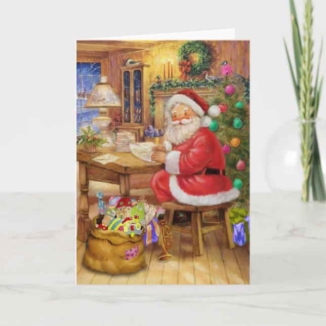Cartes Pour Fêtes Annuelles Le père noël travaillant à son bureau (Devant)