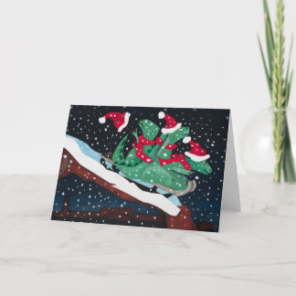 Cartes Pour Fêtes Annuelles Three sledding dinosaurs