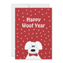 Un caniche avec une cravate arc 'Joyeux Woof Year'