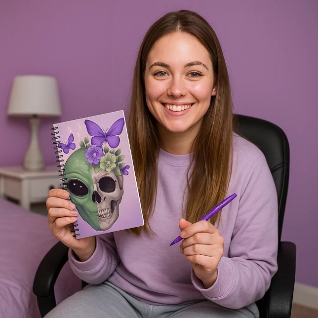 Cartoon book with alien, skull and butterfly - (Una mujer preparada para escribir en esta libreta tan bonita y diferente.)
