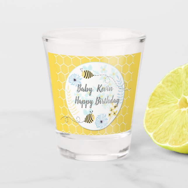 Cartoon bumblebees on a background of blue, yellow shot glass (Front)
