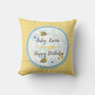 Cartoon bumblebees on a background of blue, yellow throw pillow