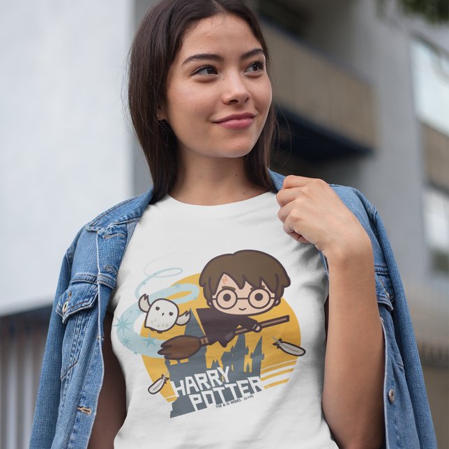 Cartoon Harry and Hedwig Flying Past Hogwarts T-Shirt (Person wearing t-shirt)