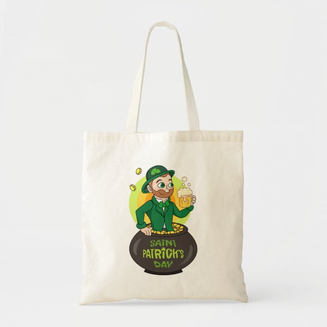 Cartoon leprechaun in a pot of gold holding a pint tote bag (Front)