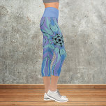 Cartoon Mandala Flower Blue and Purple Capri Leggings<br><div class="desc">This funky mandala flower design features blue and purple in a cartoon style. Trippy geometric visuals for the modern hippie or lover of vibrant colours!</div>
