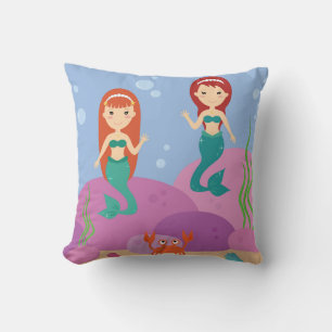 Cartoon mermaid sisters swimming in the ocean throw pillow