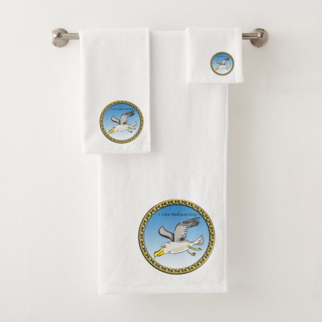 Cartoon seagull flying over head with a gold frame bath towel set (Insitu)