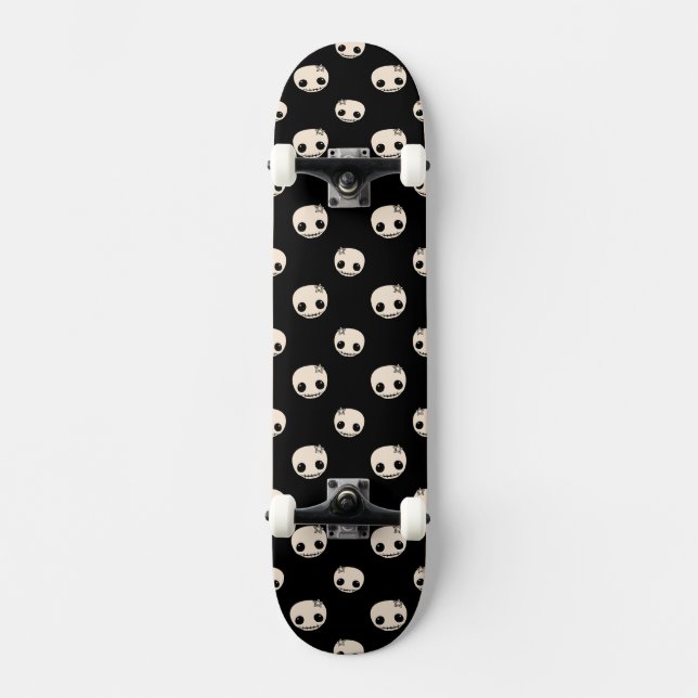 Cartoon Skulls with Star Bow  on Black Background Skateboard (Front)