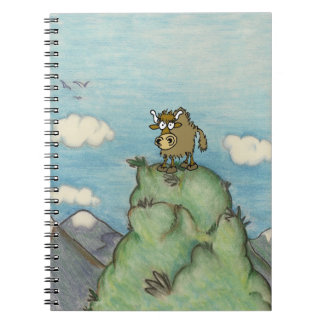 Cartoon yak drawing on mountain top notebook
