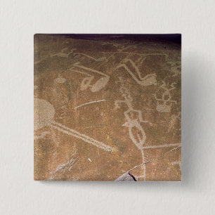 Carved petroglyph depicting figures 2 inch square button