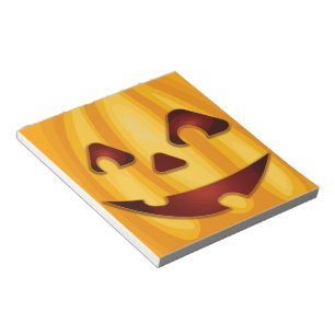 Carved pumpkin smiling Halloween design Notepad