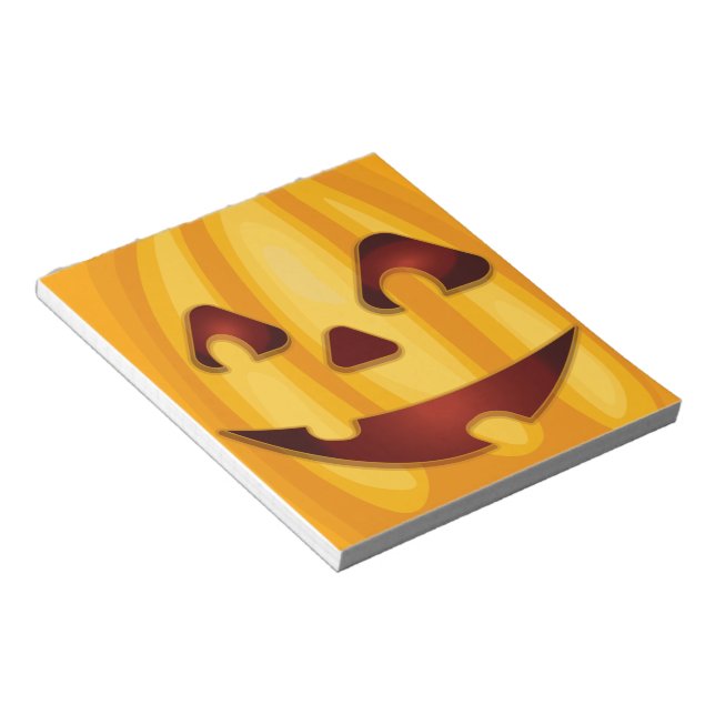 Carved pumpkin smiling Halloween design Notepad (Angled)