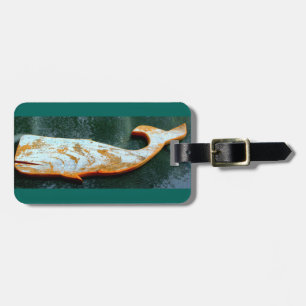 carved whale tag