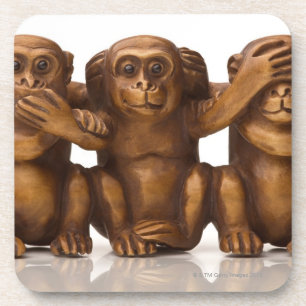 Carving of three wooden monkeys coaster