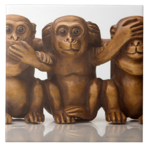 Carving of three wooden monkeys tile