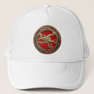 Casquette [900] Sacred Gold Octopus dans une posture défensi