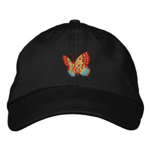 Casquette à bord du papillon rouge