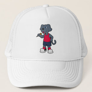 Casquette Chien comme joueur de fléchettes avec fléchettes