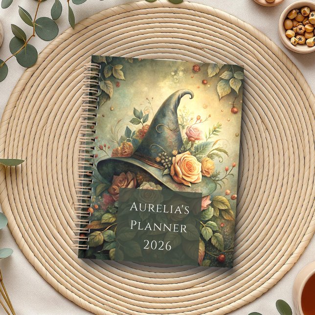 Casquette de sorcière rose - Planificateur de sorc (Rose Witch Hat – Cottagecore Witch Planner on a neutral boho table with eucalyptus, tea and seads.)