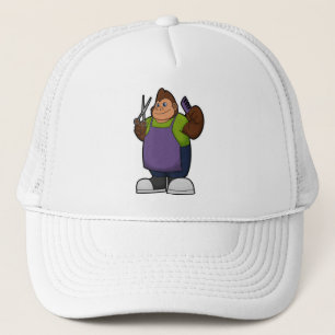 Casquette Gorilla comme coiffeur avec ciseaux et peigne
