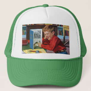 Casquette Grenouille dans la bibliothèque