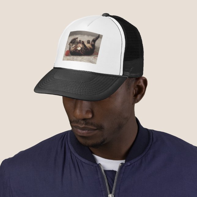 Casquette Le berceau de chat, un chat qui joue à la balle de (En situation)