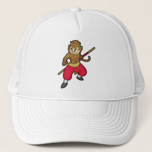 Casquette Le singe comme guerrier avec le personnel et le ba
