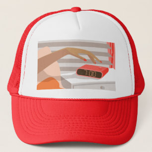 Casquette Main des femmes poussant le bouton snooze du révei
